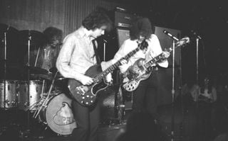 (from left) Jack Bruce, Ginger Baker, and Eric Clapton perform at the Cafe Au Go Go in New York City in October 1967