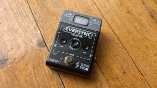 The Cloudvocal EverSync Wireless IEM transmitter on a wooden floor