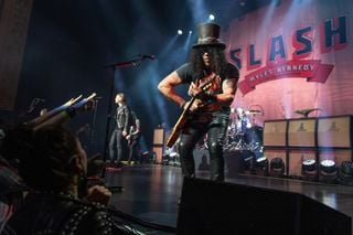 Slash performs onstage with Myles Kennedy and the Conspirators at the Paramount Theatre in Seattle, Washington on February 9, 2022