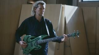 Chris Squire (1948-2015) of English progressive rock group Yes recording at Metropolis Studios in Chiswick, London, for Rock Aid Armenia, the Armenian earthquake appeal, 8th July 1989.
