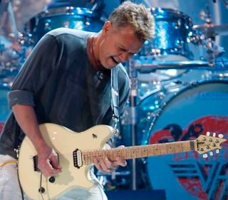 Eddie Van Halen performs onstage with Van Halen in East Rutherford, New Jersey on May 13, 2008