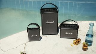 Photo of Marshall Bluetooth speakers beside a swimming pool