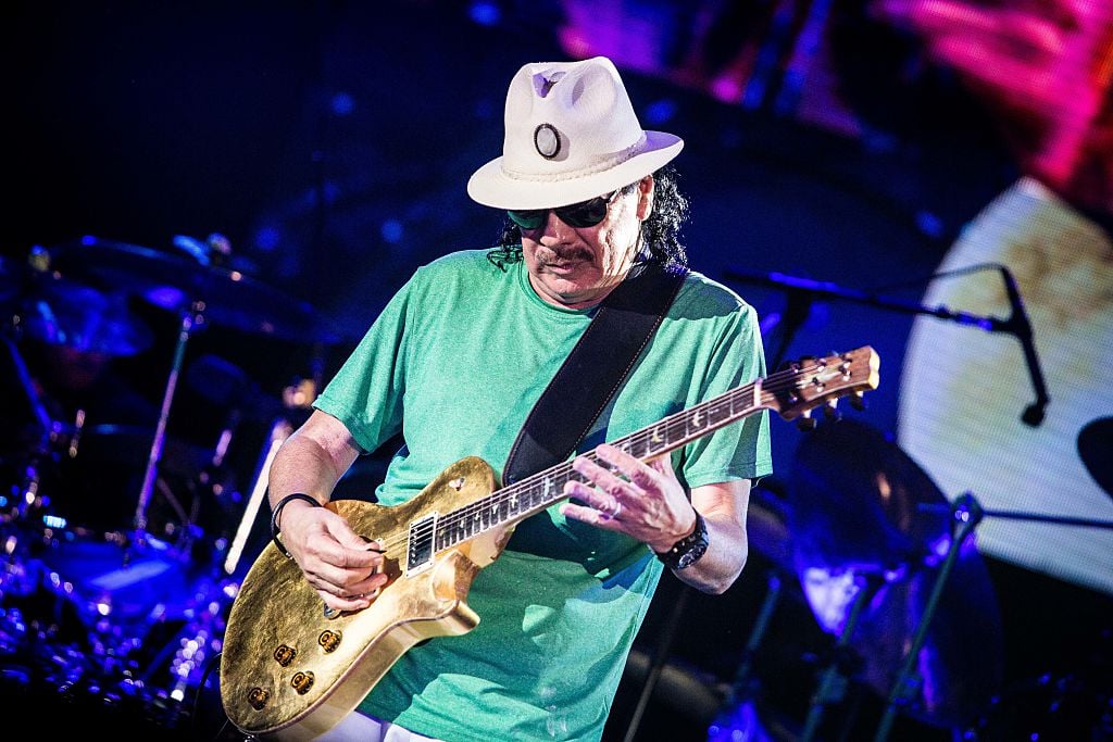 Carlos Santana pictured on stage as he performs live at Street Music Art in Assago Milan, Italy