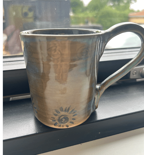 Kop med symboler 