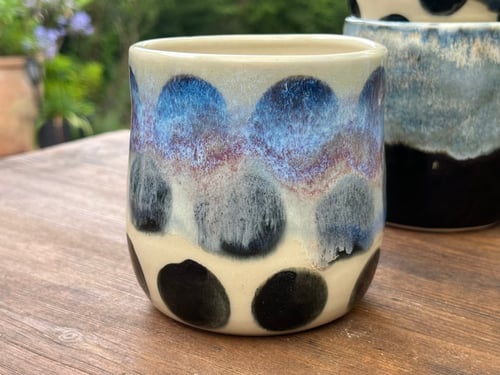 Unika krus med prikker