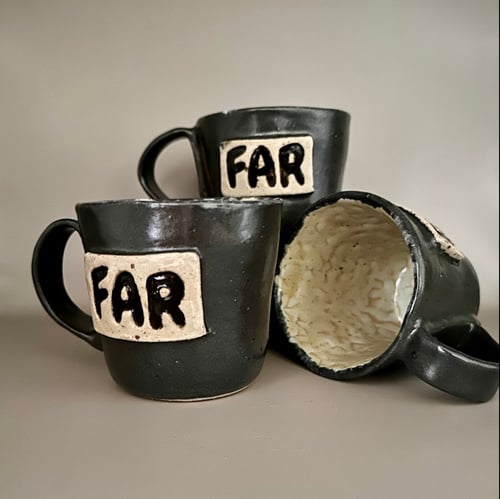 Far kop, sort med nistret lys indvendig