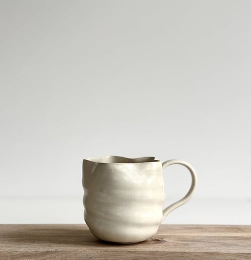 Bølgekop m. hank - beige