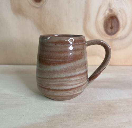 Brun swirl-kop 