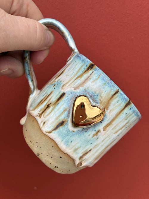 Hjertekop med guld hjerte