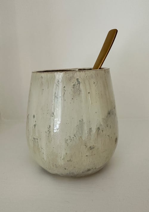 Dråbeformet kop, Beach