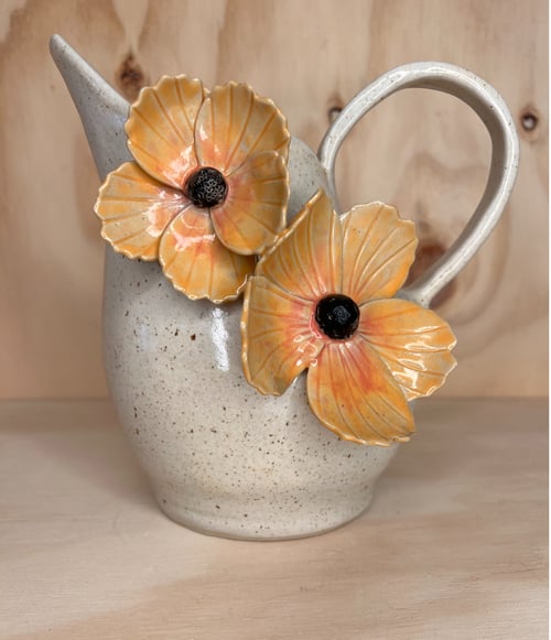Kande med orange blomster fra Sofiececilie