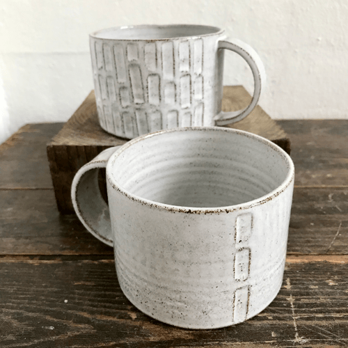 Kop med hank, hvidnistret