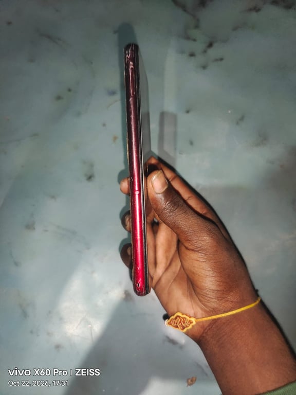 Android Smartphone with Waterdrop Notch, Red Frame (brand and model not visible), photo 2