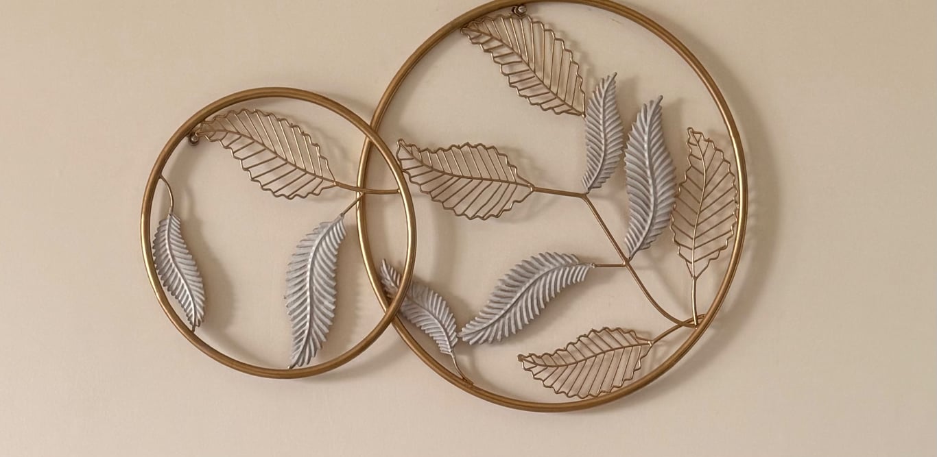 Gold Metal Wall Art – Two Interlocking Rings with Leaf Design