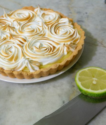 Lemon cake with a half lemon next to it