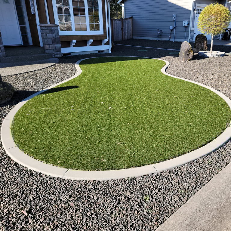 picture of landscape curbing surrounding a manicured lawn