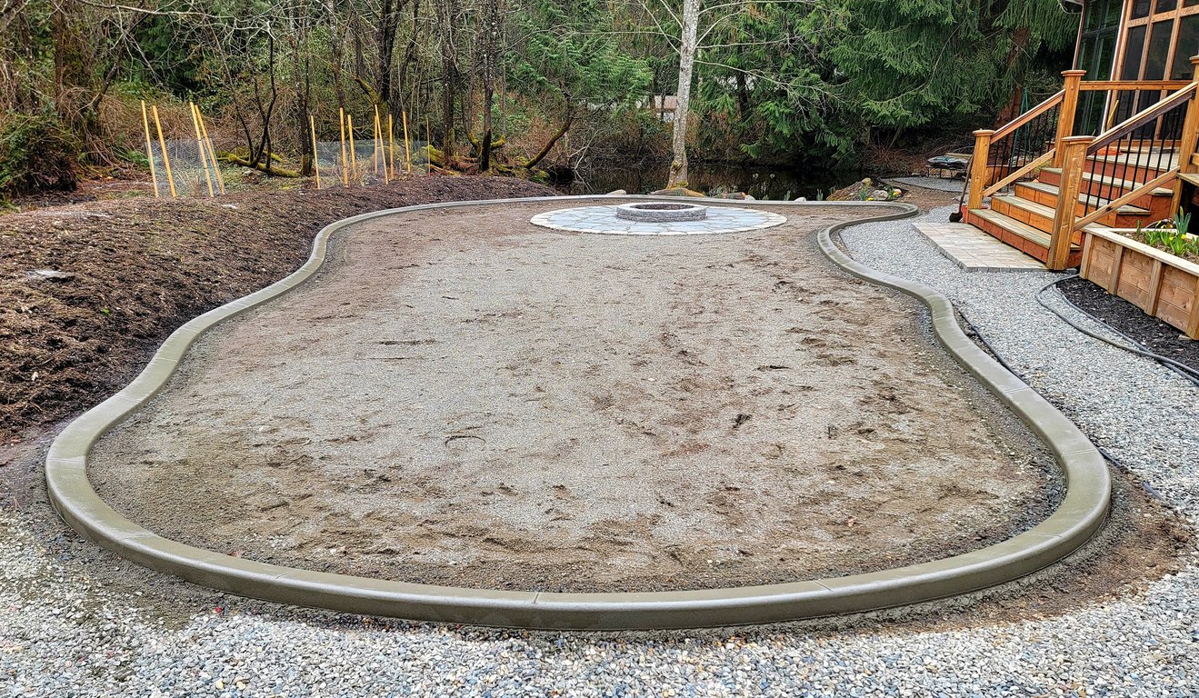Curbing framing an area with a firepit