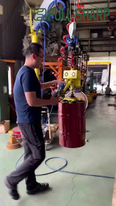 Thiết bị tay cầm khí nén nâng hạ kẹp thùng phuy, thùng phi, thùng thép.