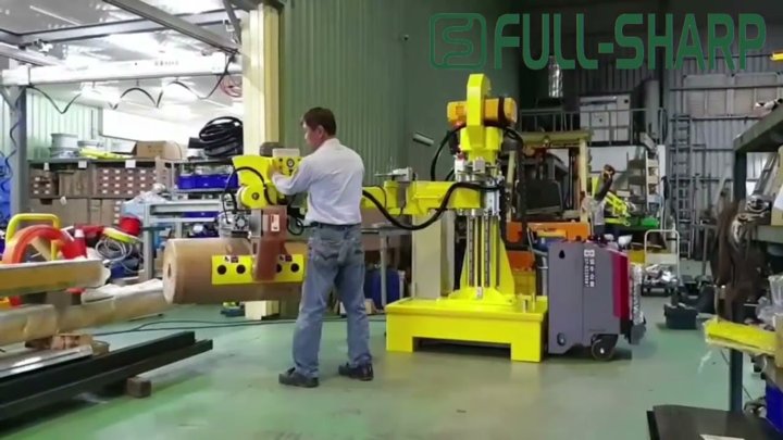 Tay nâng trợ lực kẹp nâng hạ cuộn giấy lớn. Thiết bị nâng hạ cuộn nguyên liệu