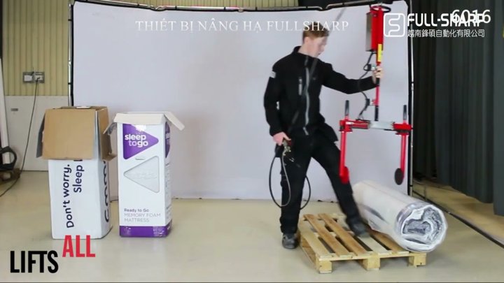 Thiết bị nâng hạ kẹp cuộn vật liệu