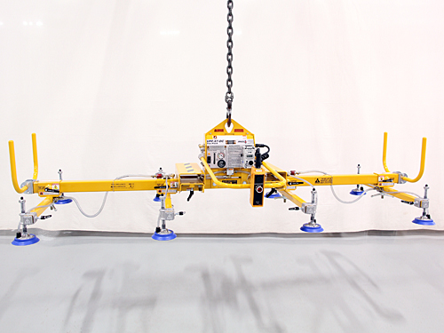 Forklift carrying a vacuum lifter on fork truck adapters, photo 5