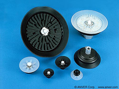 Vacuum cups with integrated check valves