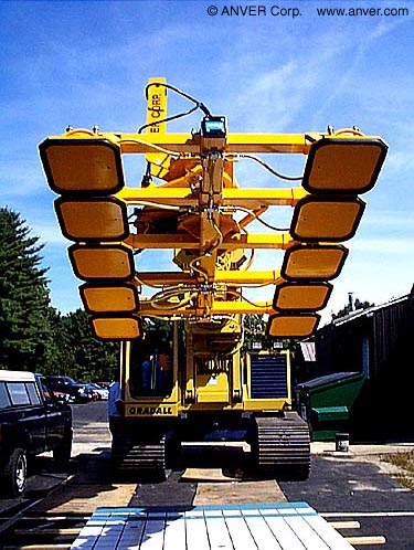 Vacuum end-effector on a Gradall excavator at a job site