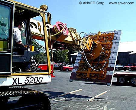 Vacuum end-effector on a Gradall excavator at a job site
