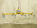 Examples of eight pad adjustable crossarm lifters