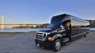 Medium Party Bus with Onboard Restroom Rental for Up to 28 Guests Transportation - Featured