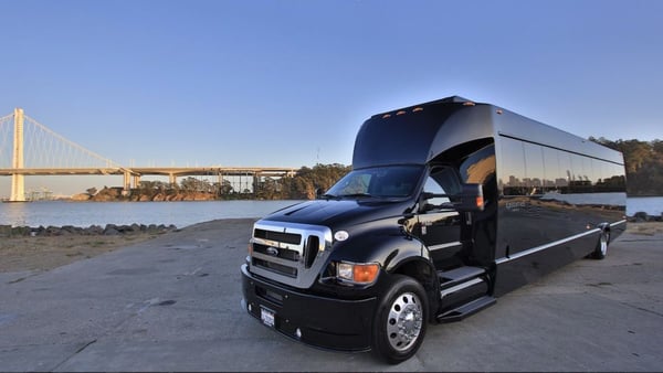 Medium Party Bus with Onboard Restroom Rental for Up to 28 Guests - Anniversary - Featured image