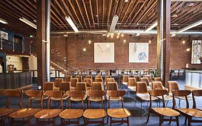 Skylit Brick Hall with Edison Lighting
