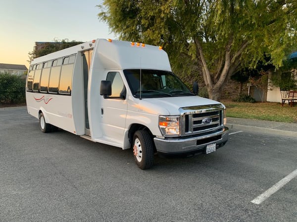 27 Passenger Executive Limo Bus Chauffeured Service for Any Event - Anniversary - Featured image