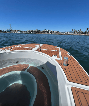 Hot tub boat bachelor party on San Francisco Bay with skyline views