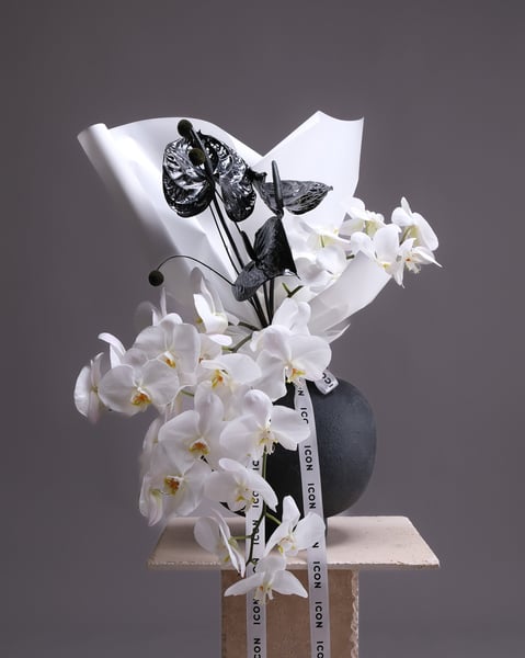 Sculptural Arrangement with White Orchids and Black Anthuriums - Gallery image