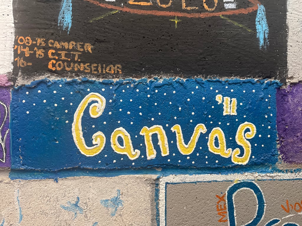 Canvas's brick on the Camp Rotary walkway