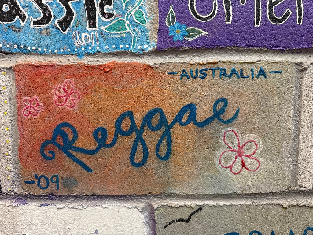 Reggae's brick on the Camp Rotary walkway