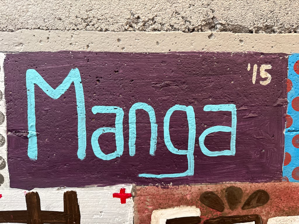 Manga's brick on the Camp Rotary walkway