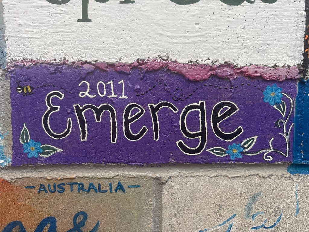 Emerge's brick on the Camp Rotary walkway