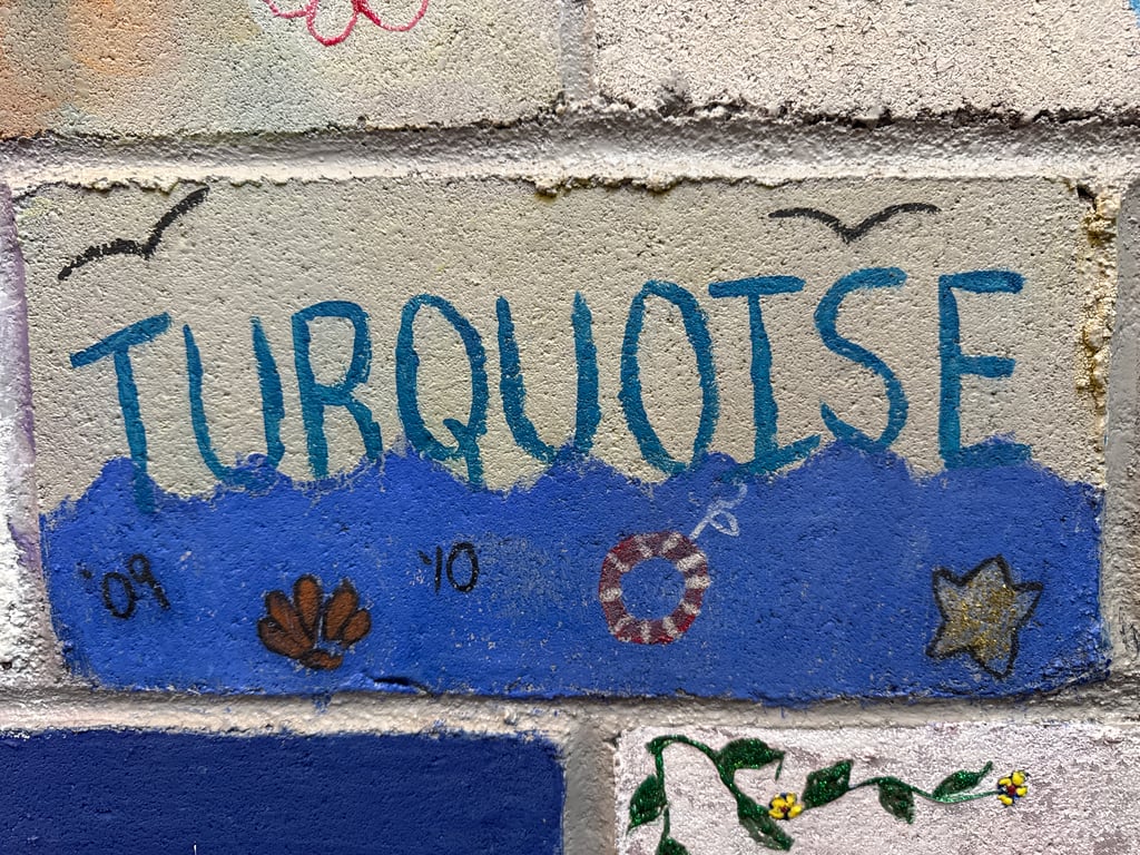 Turquoise's brick on the Camp Rotary walkway