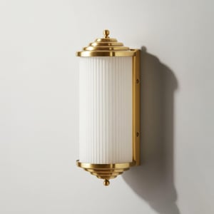Deco Baby Roddy IP44 rated wall light in brass and frosted glass