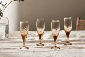 nkuku Yala Hammered Champagne Glass Set Of 4 | Glassware | Dusty Terracotta
