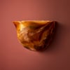 Toby wall light in tortoiseshell resin