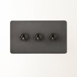 Lucian three gang 2 way toggle switch in bronze