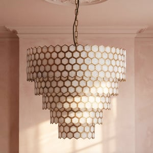 Glamazon five tier chandelier in brass and resin