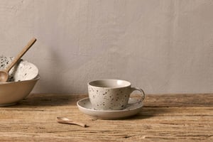 nkuku Ama Cup & Saucer | Tableware | One Size | Off White & Black