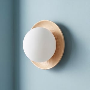 Rondel wall light in natural wood