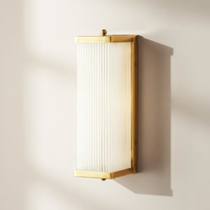 Rectangular Roddy IP44 rated wall light in brass and frosted glass