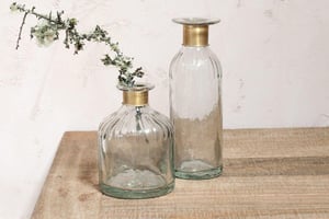 nkuku Chara Hammered Bottle | Vases & Planters | Small | Antique Brass & Clear Glass