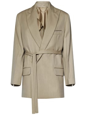 Almond-colored soft tailored trouser fabrication suit with belted blazer.